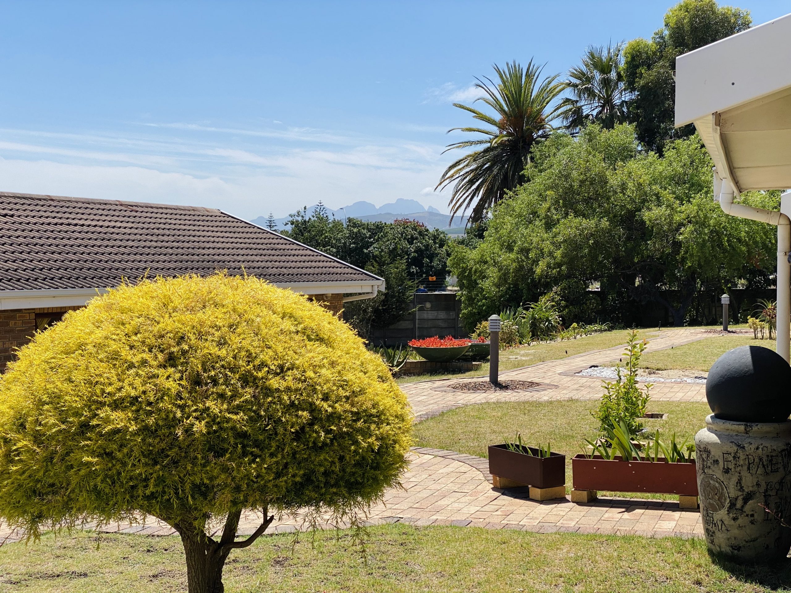 Facebrick homes and a garden at Eden Park retirement village